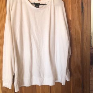 Cute white pullover sweatshirt. Zipper in back.